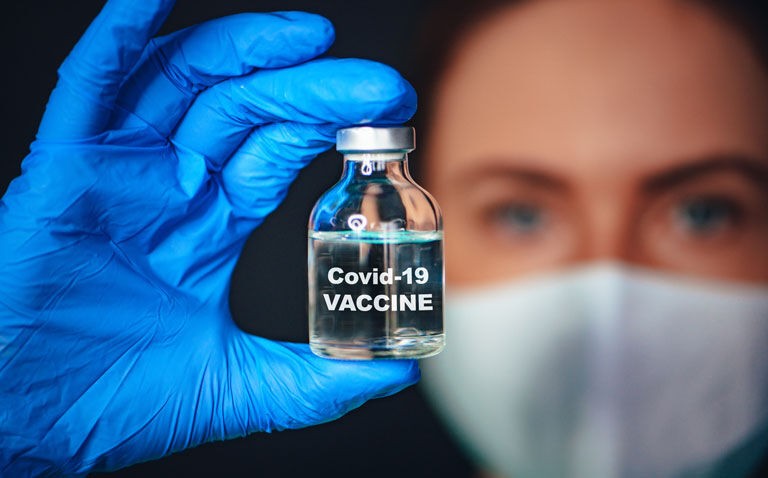 COVID-19 vaccine effectiveness highlights  possible need to continue preventative measures