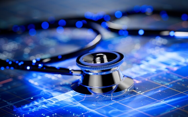 A stethoscope sitting on a digital screen showing blue lines and blurry data to illustrate a new diagnostic AI tool being more accurate than physicians