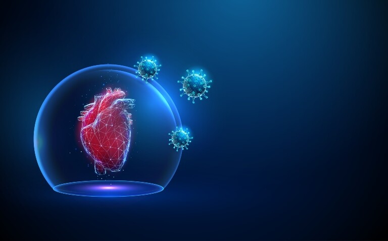 A digital illustration of an abstract red human heart in transparent dome with attacking viruses to illustrate a new ESC consensus statement on the cardiovascular effects of Covid-19