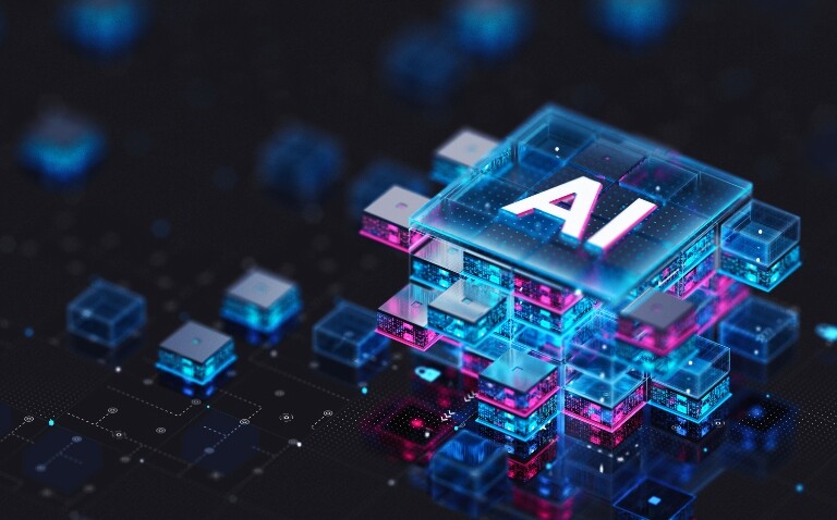the letters AI on a stack of blue and pink blocks to suggest an artificial intelligence processor and illustrate a new white paper on the evolving clinician relationship with AI