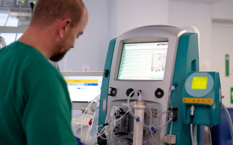 Doctor working with ECMO machine