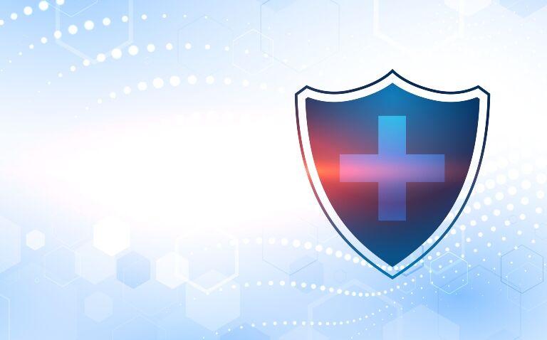 A blue shield with a pharmacy cross in the centre to illustrate antibiotic prescribing and antimicrobial resistance