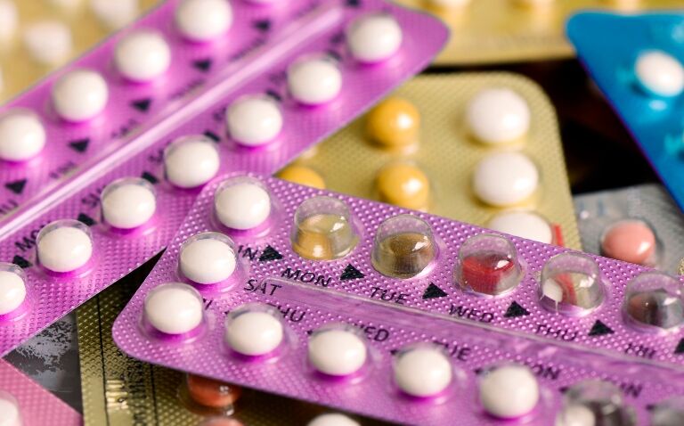 a pile of contraceptive pill packets to illustrate myocardial infarction and stroke risk being found to be higher with certain hormonal contraceptives