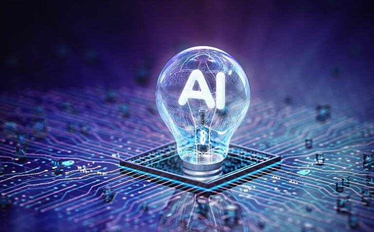 A glowing light bulb with AI in the centre