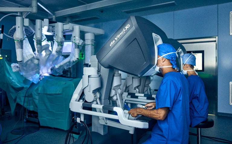 Surgeons using a robotic surgical system to illustrate advances in the treatment of endometriosis