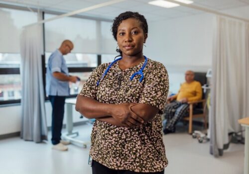 A portrait of a mid adult female doctor wearing a stethoscope