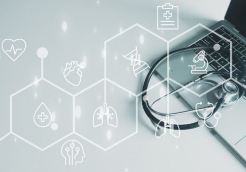 Stethoscope on laptop with medical icons over the top representing lung health