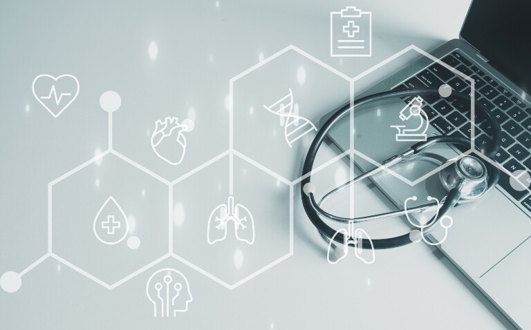 Stethoscope on laptop with medical icons over the top representing lung health