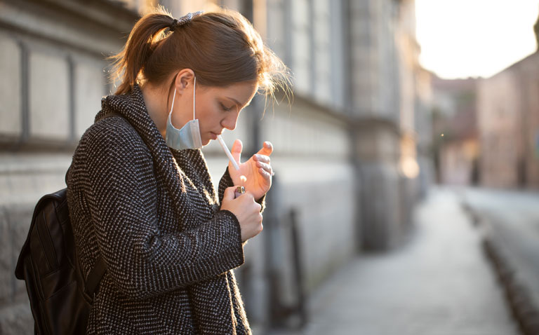 Dual analytical approach reveals causal link between smoking and outcomes in Covid-19