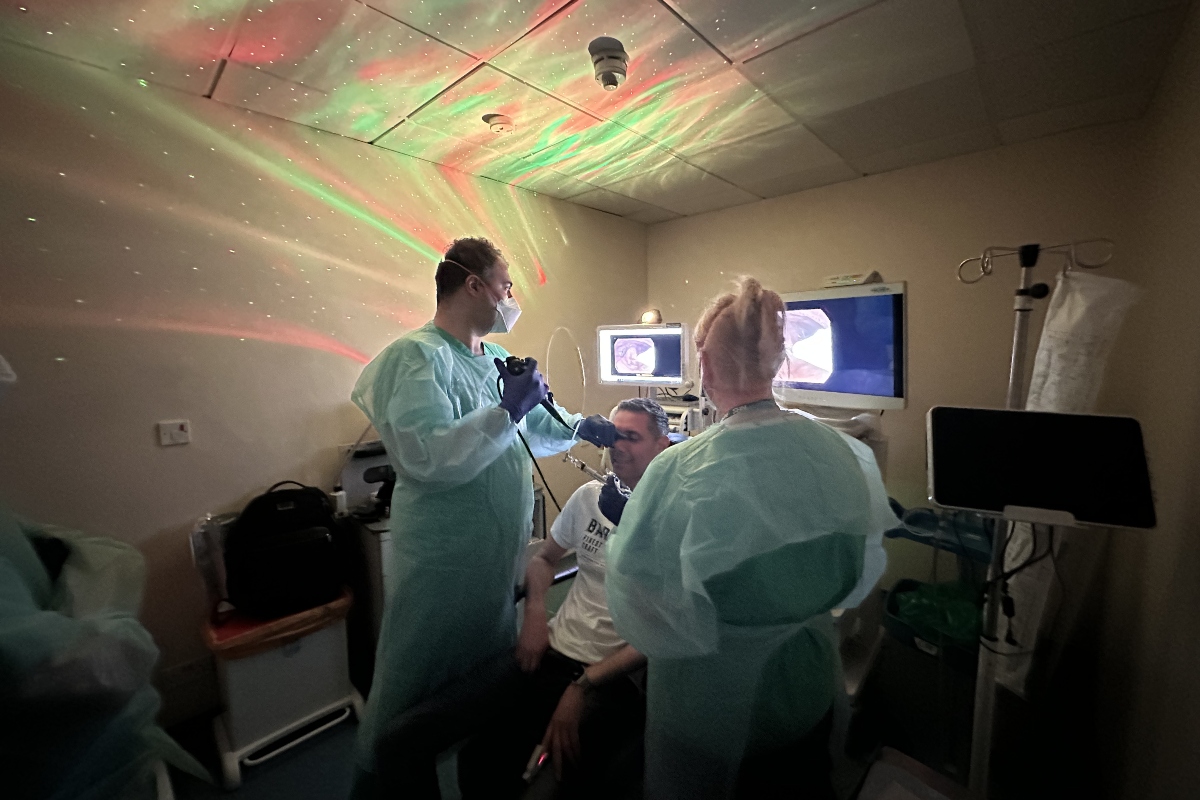 Professor Reza Nouraei performing an awake endoscopy on a patient using mindfulness techniques
