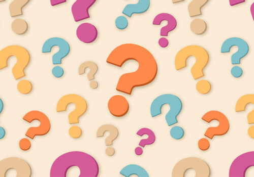 A series of question marks in pink