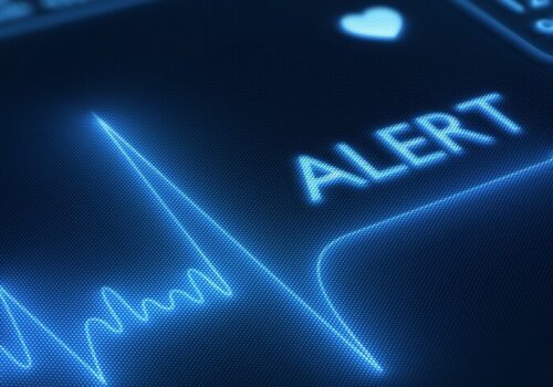 Flat line alert on an ECG monitor to illustrate that patient-reported quality of life after cardiac arrest predicts long-term outcomes