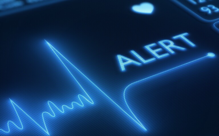 Flat line alert on an ECG monitor to illustrate that patient-reported quality of life after cardiac arrest predicts long-term outcomes