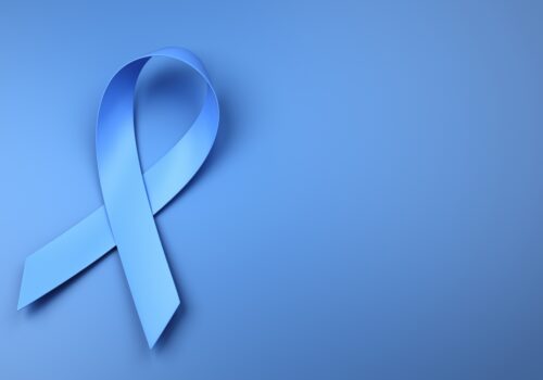 A light blue prostate cancer awareness ribbon on a matching blue background to illustrate the trajectory of prostate cancer diagnostics and treatment
