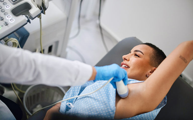 Ultrasound AI differentiates between malignant and COVID-19 vaccine-induced lymph node changes
